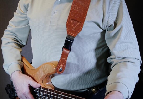 a person holding a guitar